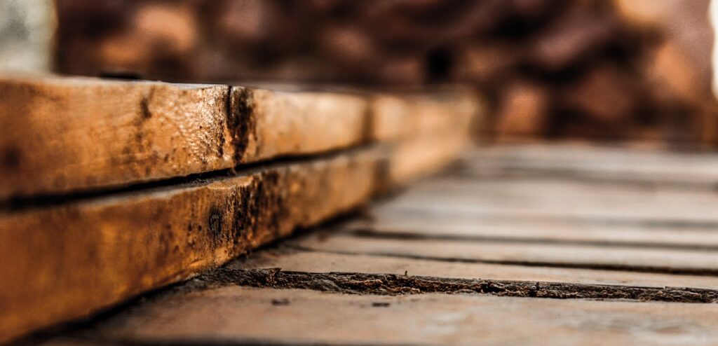 Detailed close-up of rustic wooden planks showcasing texture and earthy tones.
